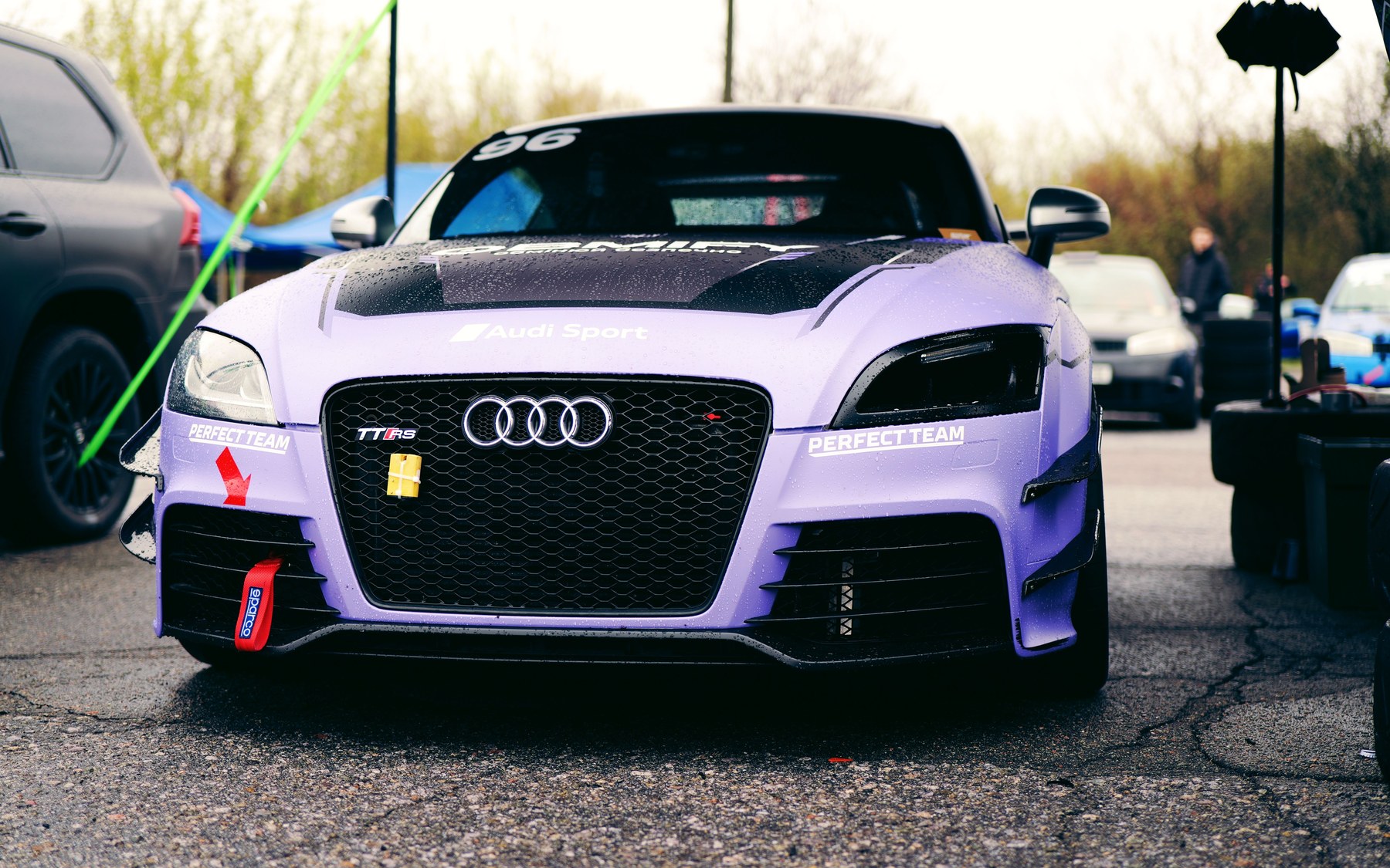 Modified lilac Audi TT RS 8J race car with a carbon bonnet and tow strap, the TTS's body